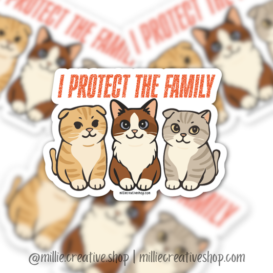 Sticker with three cartoon cats and 'I Protect the Family' text on a blurred background.
