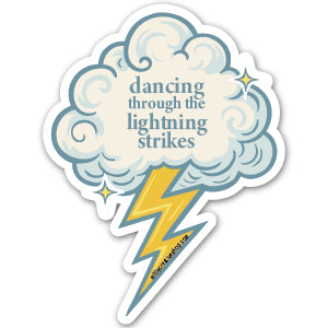 Sticker with cloud design, lightning bolt, and text 'dancing through the lightning strikes' on a white background.